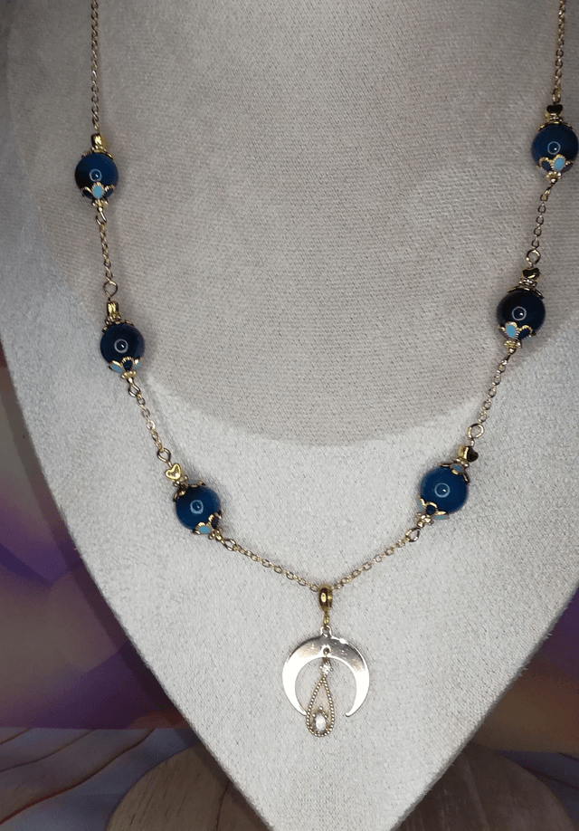 Collier perles et pendentif