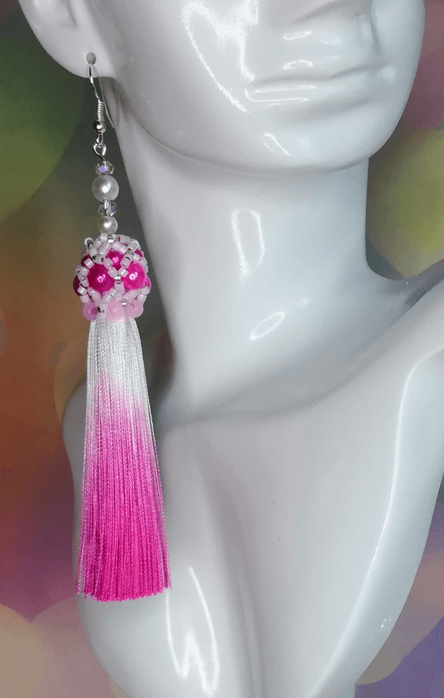 Boucles d&#039;oreille pompon rose