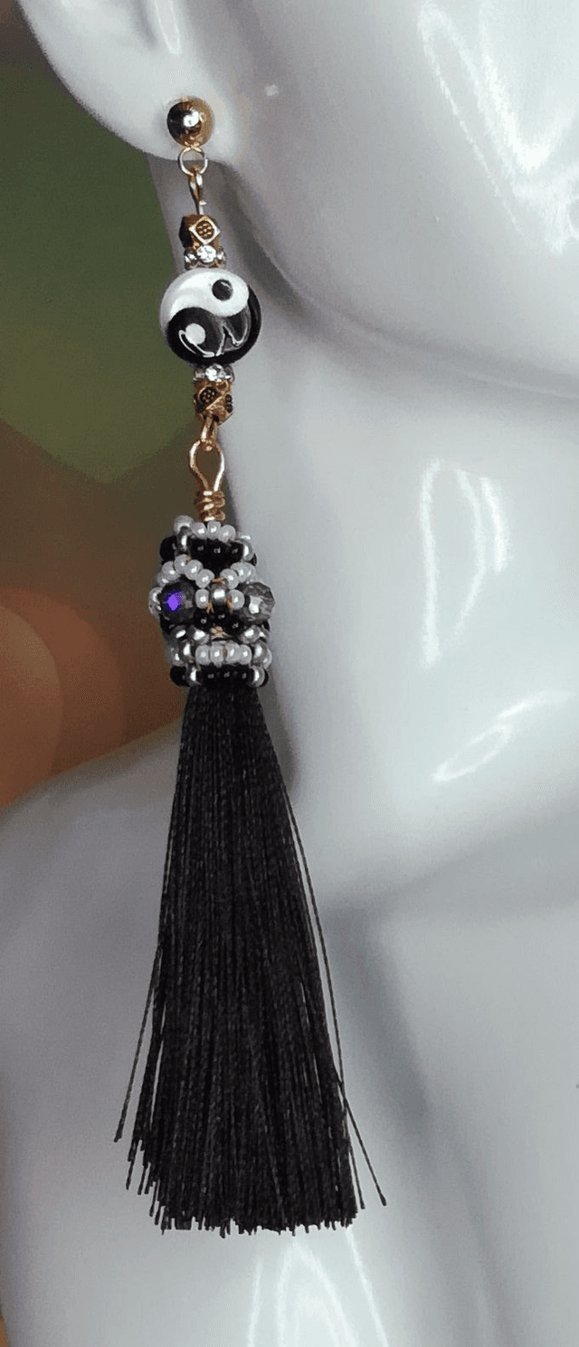 Clous d&#039;oreille pompon café