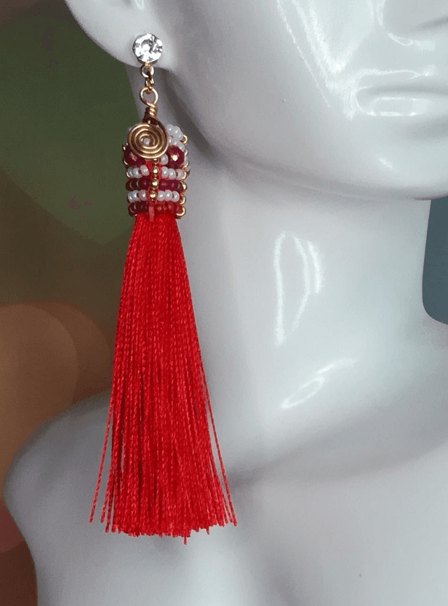 Boucles d&#039;oreilles pompon spirale